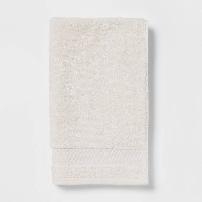 cream colored bath towels