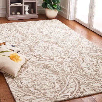 Ivory and Beige Abstract Wool 6' x 9' Handmade Tufted Rug