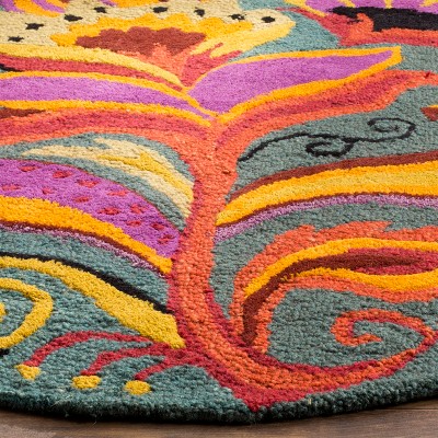 Handmade Blue Floral Tufted Wool Round Area Rug
