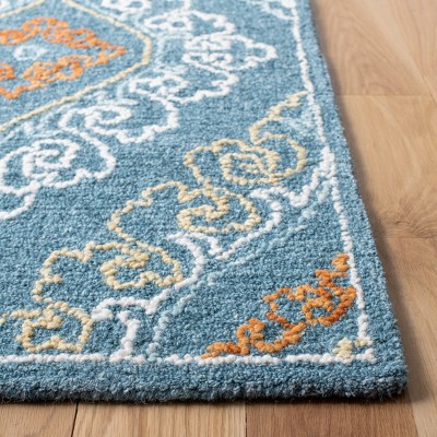 Hand-Tufted Country Casual Blue Wool Rectangular Rug 4' x 6'