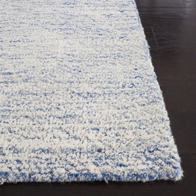 Blue and Ivory Floral Hand-Tufted Wool Area Rug, 5' x 8'