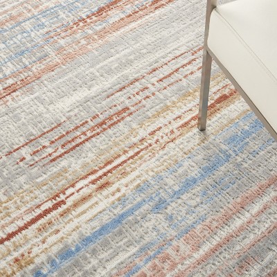Ivory Multicolor Abstract Synthetic 5' x 7' Easy-Care Area Rug