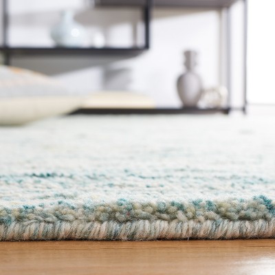 Turquoise and Ivory Handmade Wool Shag Area Rug, 3' x 5'