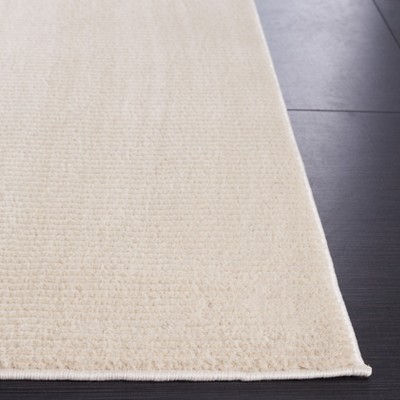 Ivory Solid Synthetic Easy-Care Hand-Knotted Rug