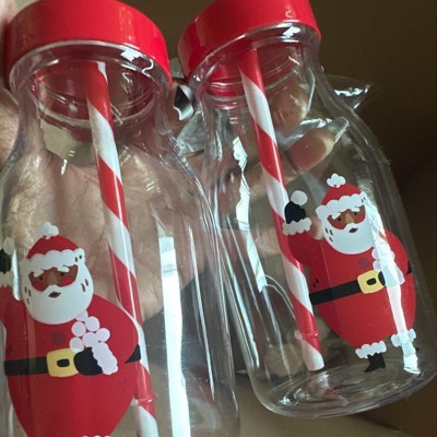 Christmas Milk For Santa In Bottle With Straw And Peppermint Candy