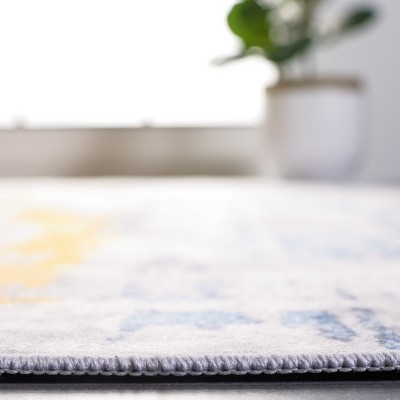 Gray and Blue Abstract Synthetic 4' x 6' Area Rug
