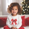 The Juniper Shop Coquette Christmas Snowflake Bow Toddler Graphic Sweatshirt - 2 of 3