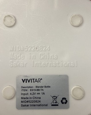 "VIVITAR," "Description: Blender Bottle," "ITEM: ES15-BB-TA" and "MID #5220824" located under the white plastic base of the bottle