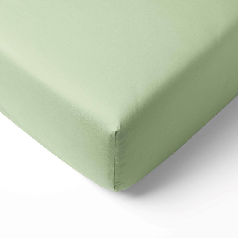 Bacati - Solid Light Green 100 percent Cotton Universal Baby US Standard Crib or Toddler Bed Fitted Sheet, 1 of 7