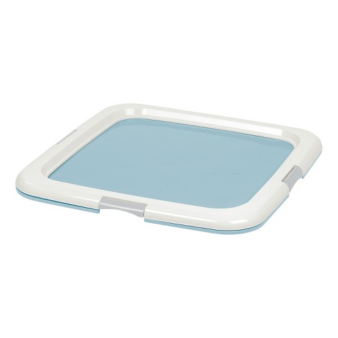 Wee wee pad clearance tray