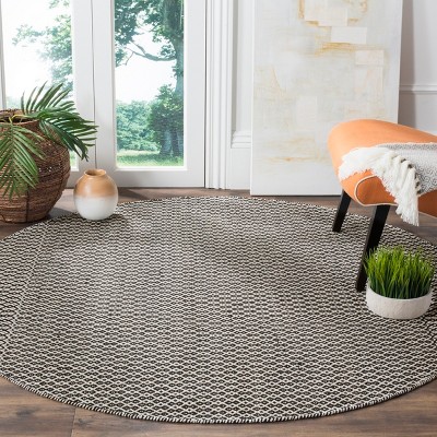 Coastal Charm Black and Ivory Geometric Handwoven Round Rug