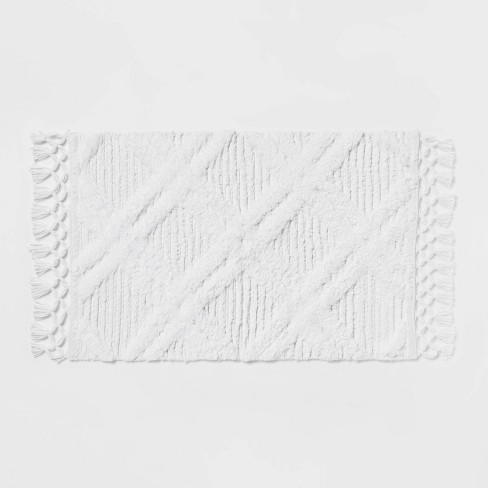 Diamond Embossed Tasseled Woven Bath Rug White - Threshold™