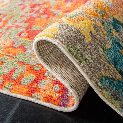 Ivory and Multicolor Abstract Distressed Area Rug