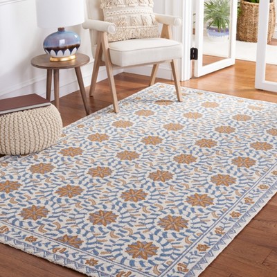 Ivory and Blue Hand-Hooked Floral Wool Area Rug, 9' x 12'