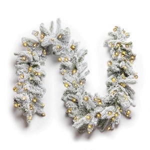 King Of Christmas 9ft Christmas Garland with LED lights, King Flock Artificial Snow Flocked Prelit Garland Plug In - 1 of 4