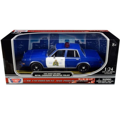 1986 Dodge Diplomat "Royal Canadian Mounted Police" Metallic Blue and White 1/24 Diecast Model Car by Motormax