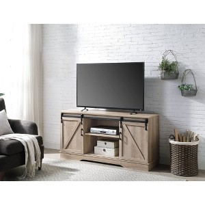 65" Composite Wood TV Stand with 2 Sliding Doors and Multiple Storage Compartments for Living Room - 1 of 4