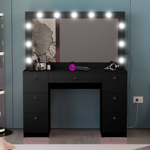 Black makeup store vanity with lights