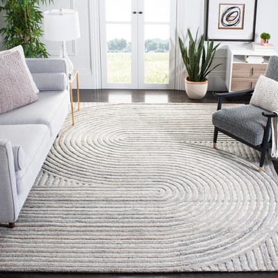 Beige 8' x 10' Handmade Wool and Synthetic Area Rug