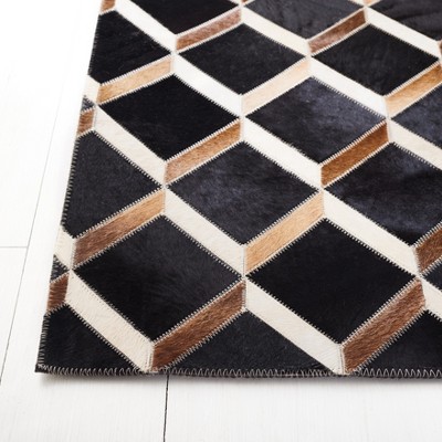 Handmade Black Geometric Wool and Cowhide Rug, 4' x 6'