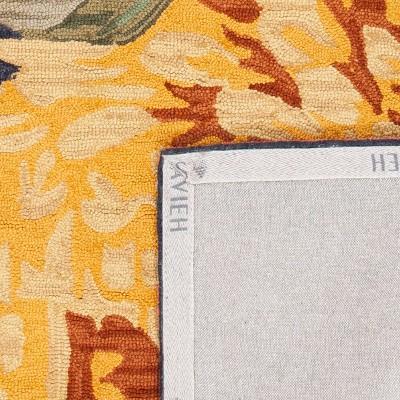 Handmade Black and Yellow Floral Wool Rug