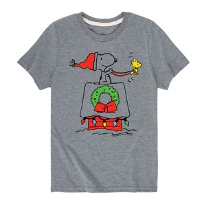 Boys' - Peanuts - Snoopy and Woodstock Christmas Skating Short Sleeve Graphic T-Shirt - 1 of 4