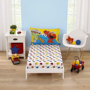 Sesame Street Come and Play Blue, Green, Red and Yellow 2 Piece Toddler Sheet Set - Fitted Bottom Sheet and Reversible Pillowcase