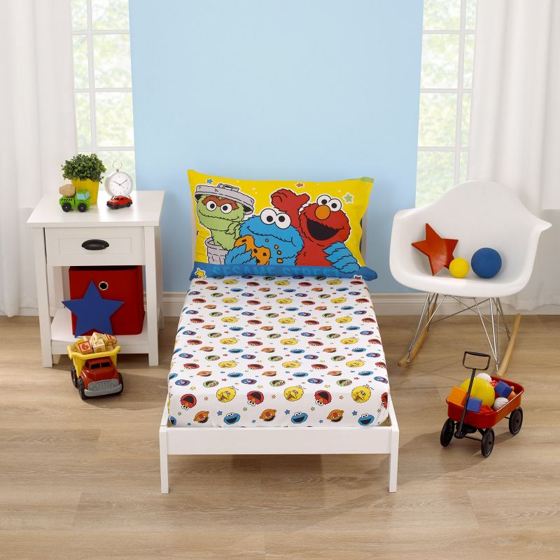 Sesame Street Come and Play Blue, Green, Red and Yellow 2 Piece Toddler Sheet Set - Fitted Bottom Sheet and Reversible Pillowcase, 1 of 7