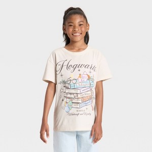 Girls' Hogwarts School of Witchcraft and Wizardry Boxy Short Sleeve Graphic T-Shirt - Cream - 1 of 4