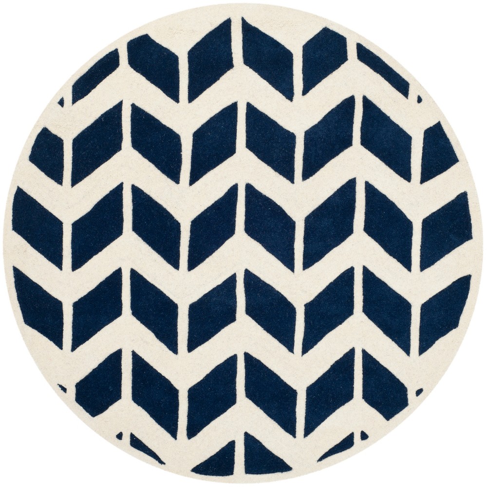 5'x5' Round Kenan Solid Tufted Accent Rug Dark Blue/Ivory Round - Safavieh