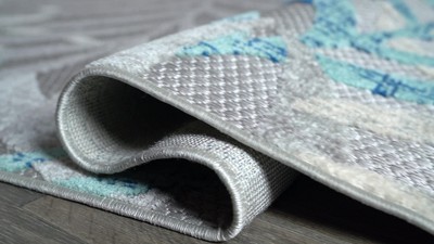 Cream and Orange Palm Leaves Synthetic 4' x 6' Area Rug