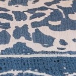 blue cushion/gray wicker