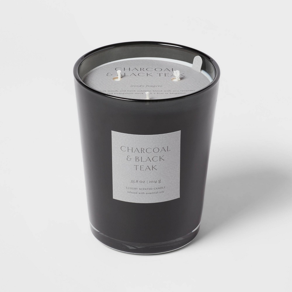 35.8oz Colored Vase Glass with Dustcover & Black Teak Candle Black - Threshold™: Palm Wax, 3-Wick, 70hr Burn Time