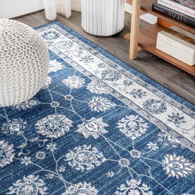 Ivory and Blue Floral Synthetic 4' x 6' Area Rug