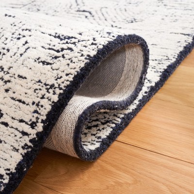 Metro Black and Ivory Hand-Tufted Wool Area Rug 8' x 10'