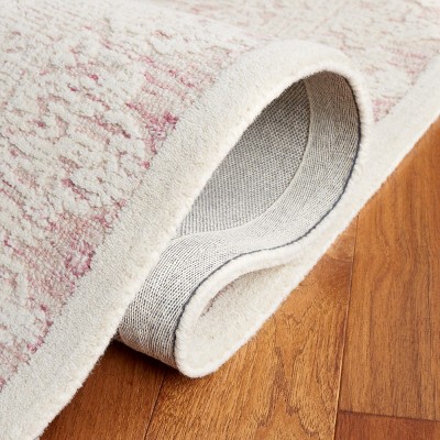 Handmade Pink and Ivory Wool Tufted 6' x 9' Area Rug