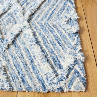 Ivory and Blue Hand-Knotted Wool 6' x 9' Area Rug