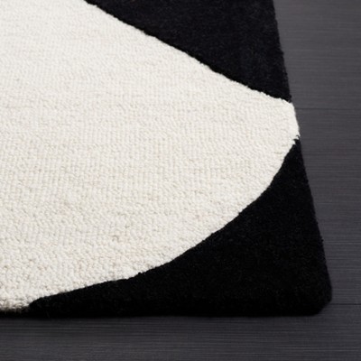 Handmade Black and Rust Geometric Wool Area Rug, 4 ft. x 6 ft.