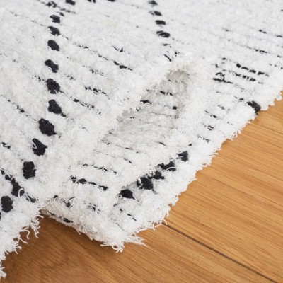 Ivory and Black Handmade Wool Shag Area Rug, 5 x 8 ft