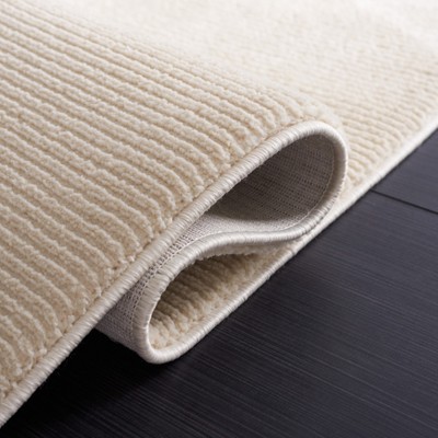Ivory Solid Synthetic Easy-Care Hand-Knotted Rug