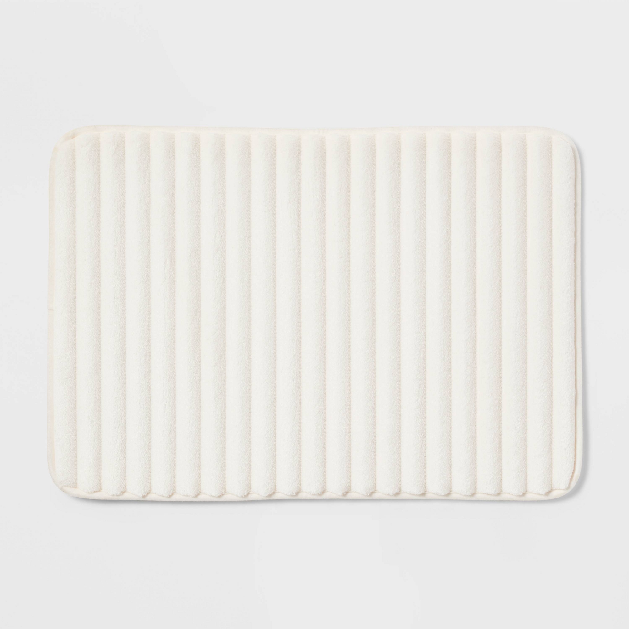 17"x24" Ribbed Cushion Foam Bath Rug Cream - Room Essentials™