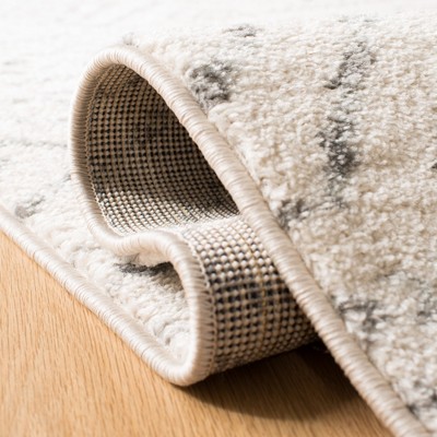 Ivory Boho-Chic Hand-Knotted Synthetic Area Rug