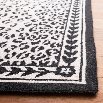 White and Black Hand-Knotted Wool Floral Runner Rug