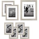 Americanflat 7 Pack Gallery Wall Set | Displays One 11x14, Two 8x10, and Four 5x7 inch photos. Shatter-Resistant Glass. Hanging Hardware Included!