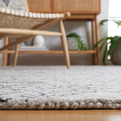 Casablanca 3' x 5' Black and Ivory Wool Hand-Tufted Shag Rug