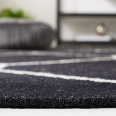 Handmade Black/Ivory Wool Flat Woven 4' x 6' Area Rug