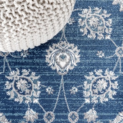 Ivory and Blue Floral Synthetic 4' x 6' Area Rug