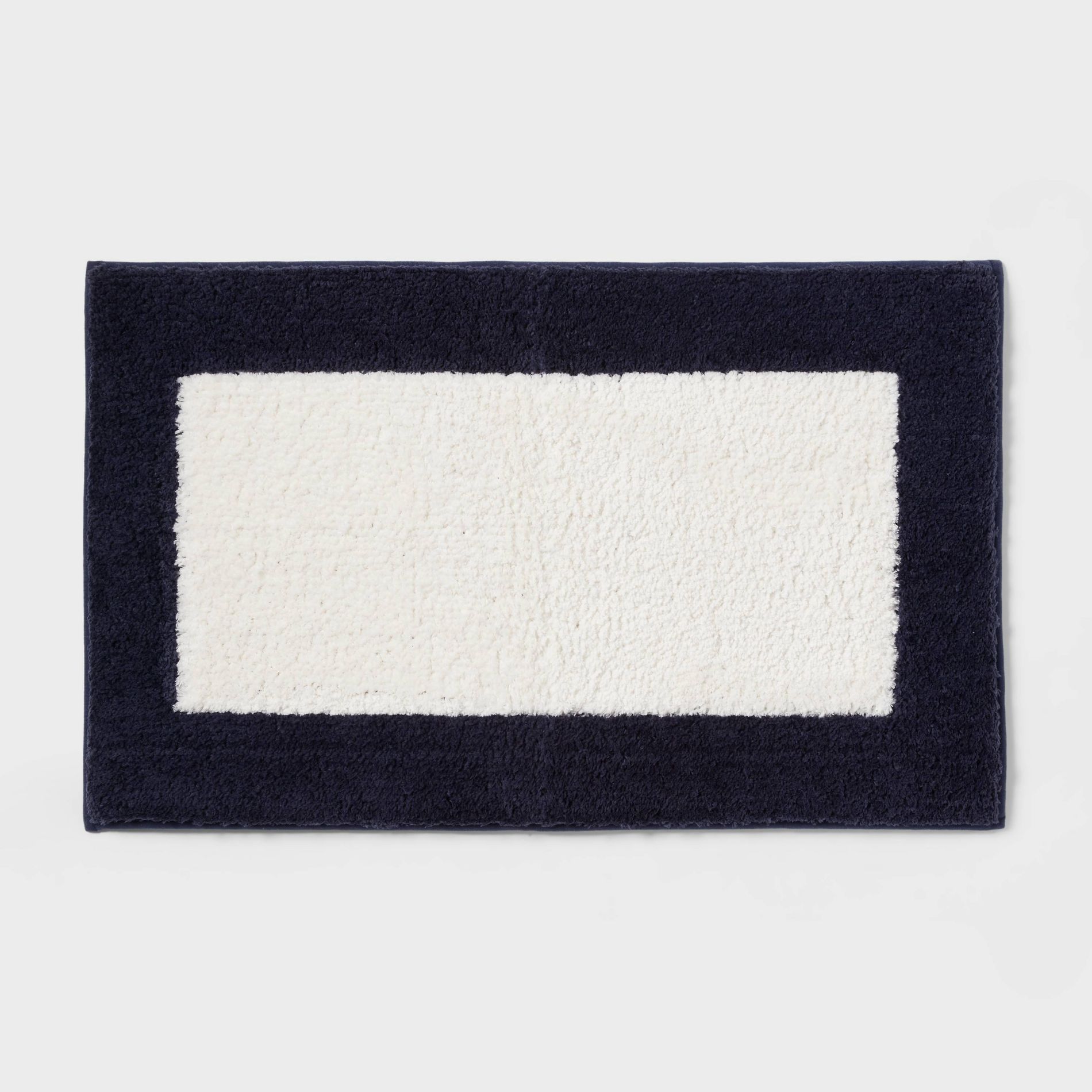 20"x34" Fluffy Border Memory Foam Bath Rug Navy - Threshold™