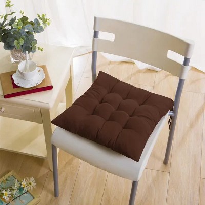 Brown tufted chair cushion pad on a chair seat