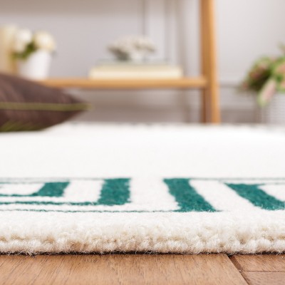 Ivory and Green Hand-Tufted Wool 6' x 9' Rectangular Rug